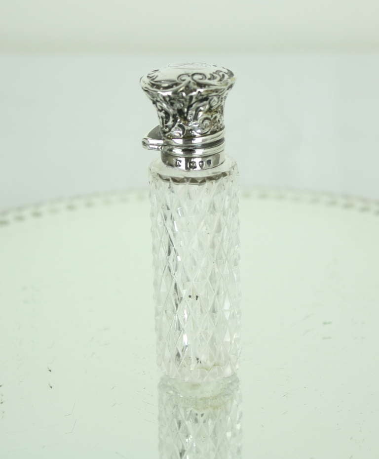 Collection of Four English Hallmarked Silver and Crystal Scent Bottles 2