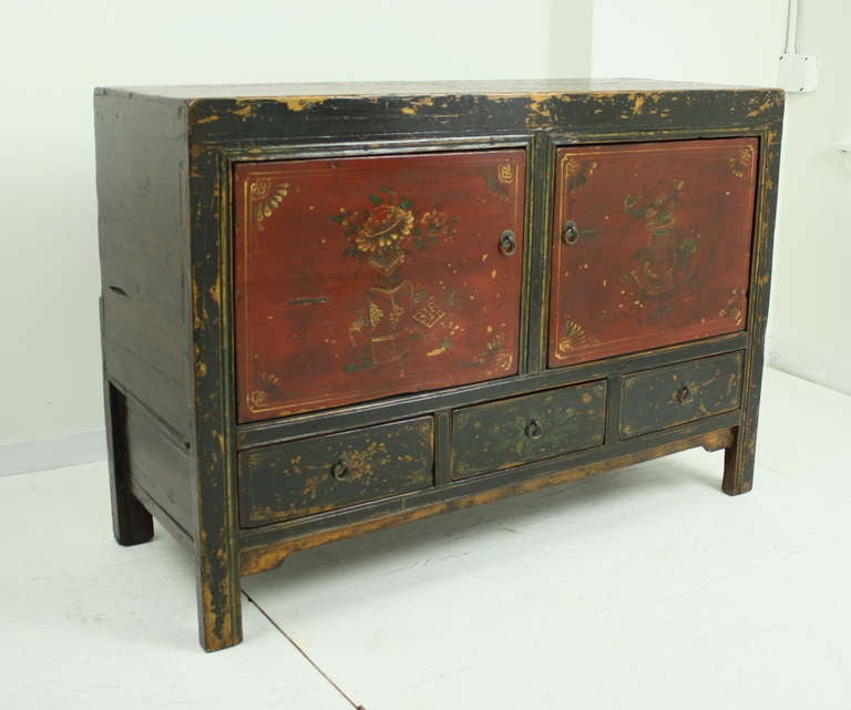 Very smart Chinese piece, quite rustic, all original paint.  Excellent storage space with two drawers below. Good height for a sideboard. Works as a buffet or console. Would look great as a sofa table,