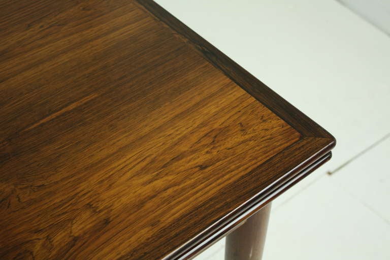 Mid Century Danish Rosewood Drawleaf Dining Table In Excellent Condition In Port Chester, NY