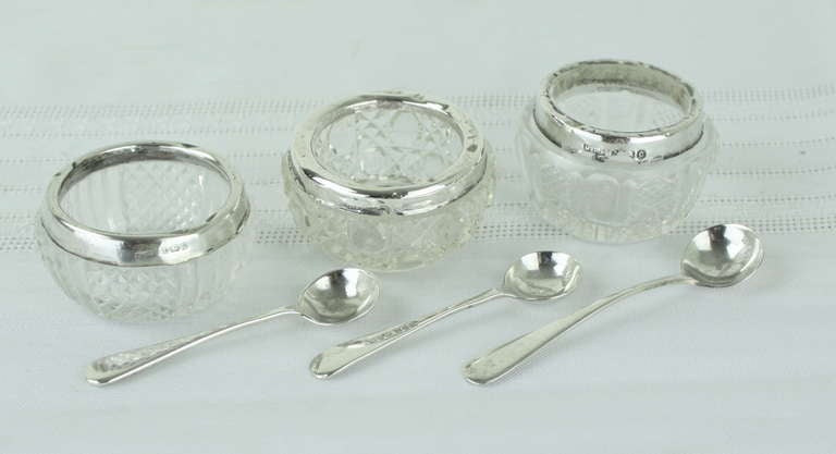 Group of Three Hallmarked Silver and Crystal Salts and Hallmarked Spoons