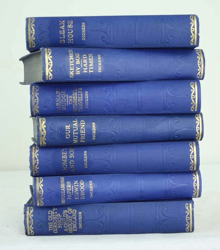 In attention-getting bright blue, this group is from a larger set of the works of Charles Dickens, published in England, 1930.  Interesting engravings illustrate the story.  Good condition, attractive addition to a library bookshelf.