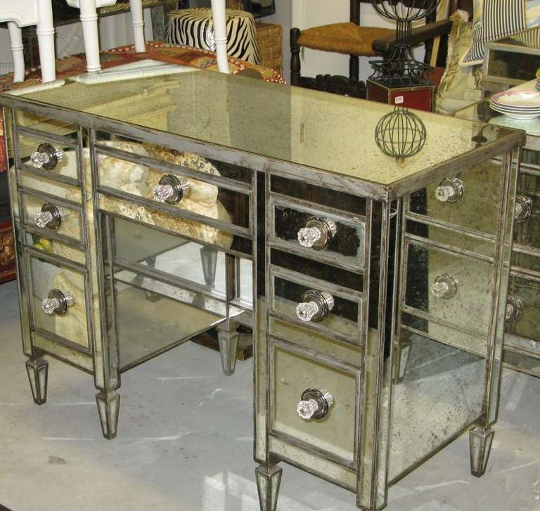 All around mirrored 7 Drawers Desk or Dressing table from the 1940's, updated later on with new inside wood & slider drawer.
The knee hole space measure : 23