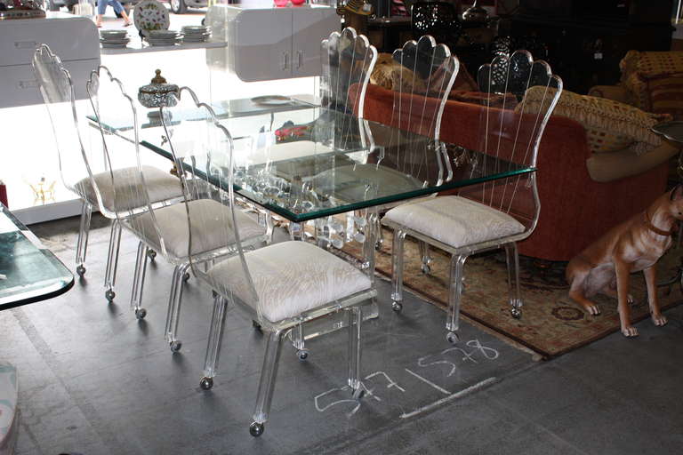 Fabulous Lucite Dining Table and Chairs Set .
The Table Glass Top Measure : 72