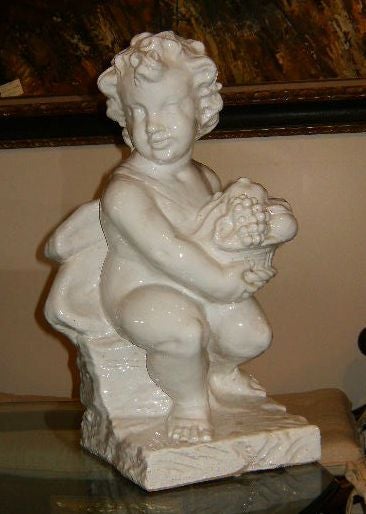 Pair of Italian Glazed Terra Cotta Putti In Good Condition For Sale In West Palm Beach, FL