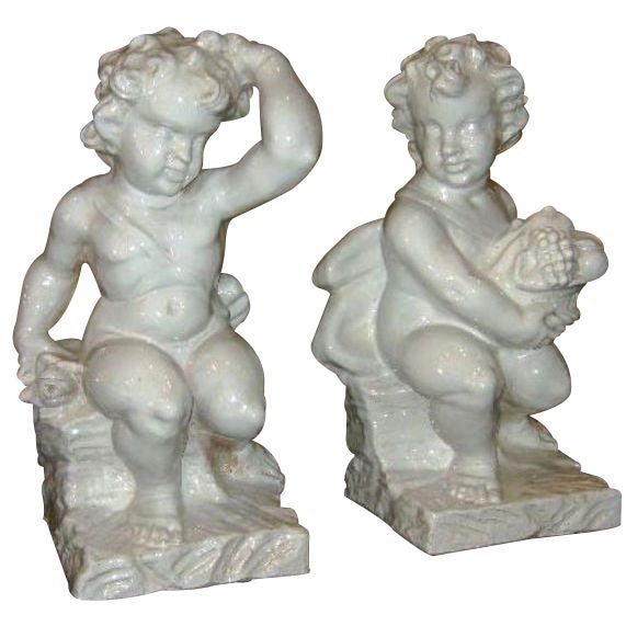 Pair of Italian Glazed Terra Cotta Putti