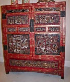 CHINESE CABINET, LAQUERED CARVED AND GILDED