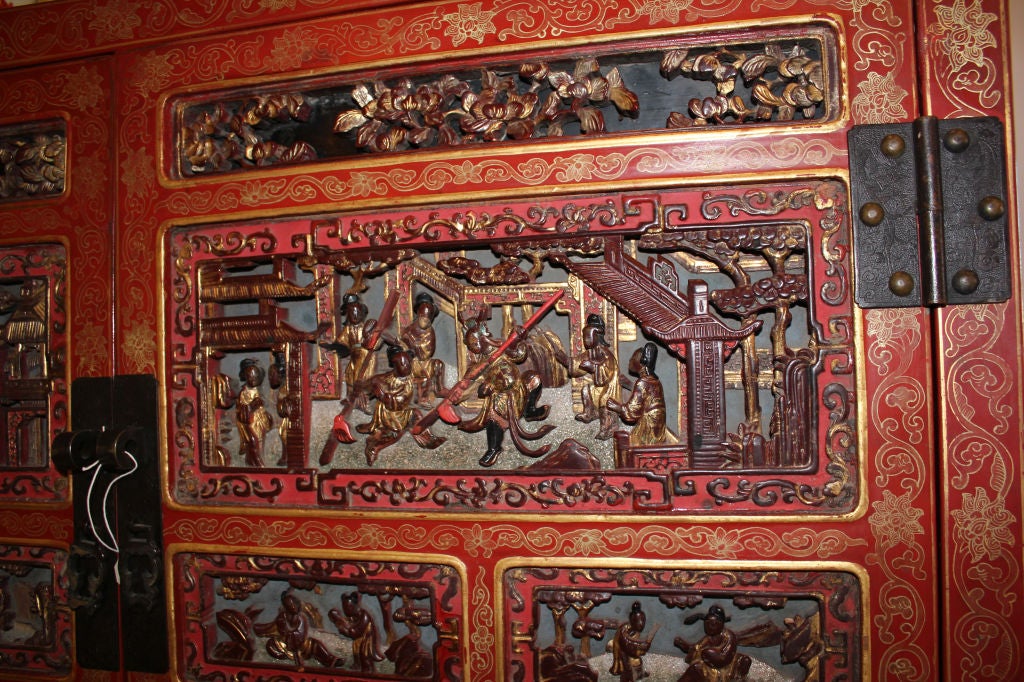 Carved CHINESE CABINET, LAQUERED CARVED AND GILDED