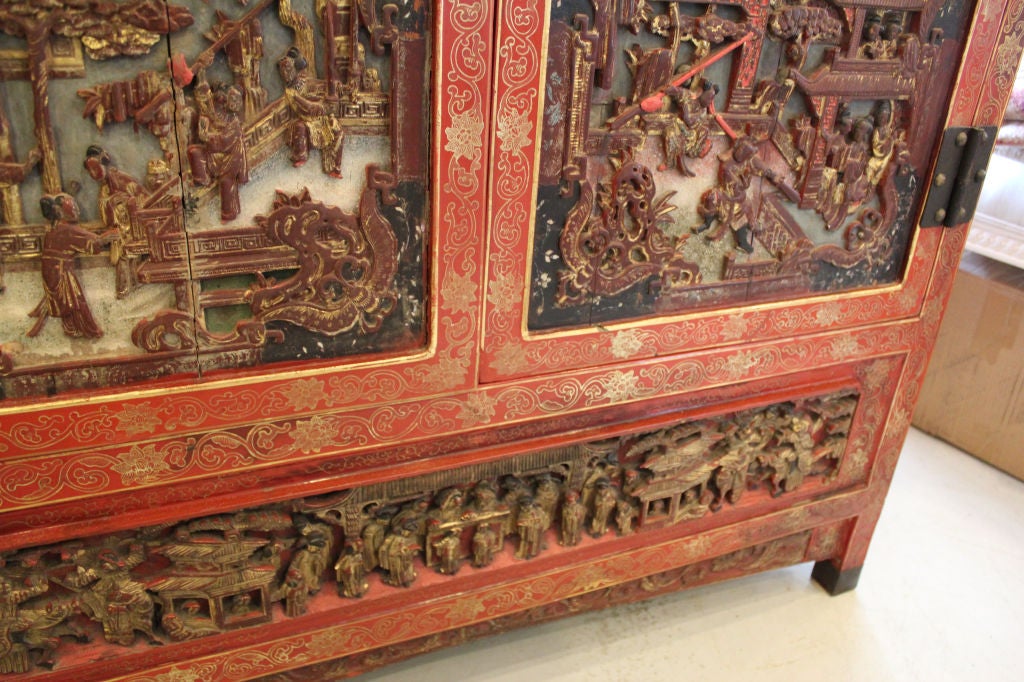 20th Century CHINESE CABINET, LAQUERED CARVED AND GILDED