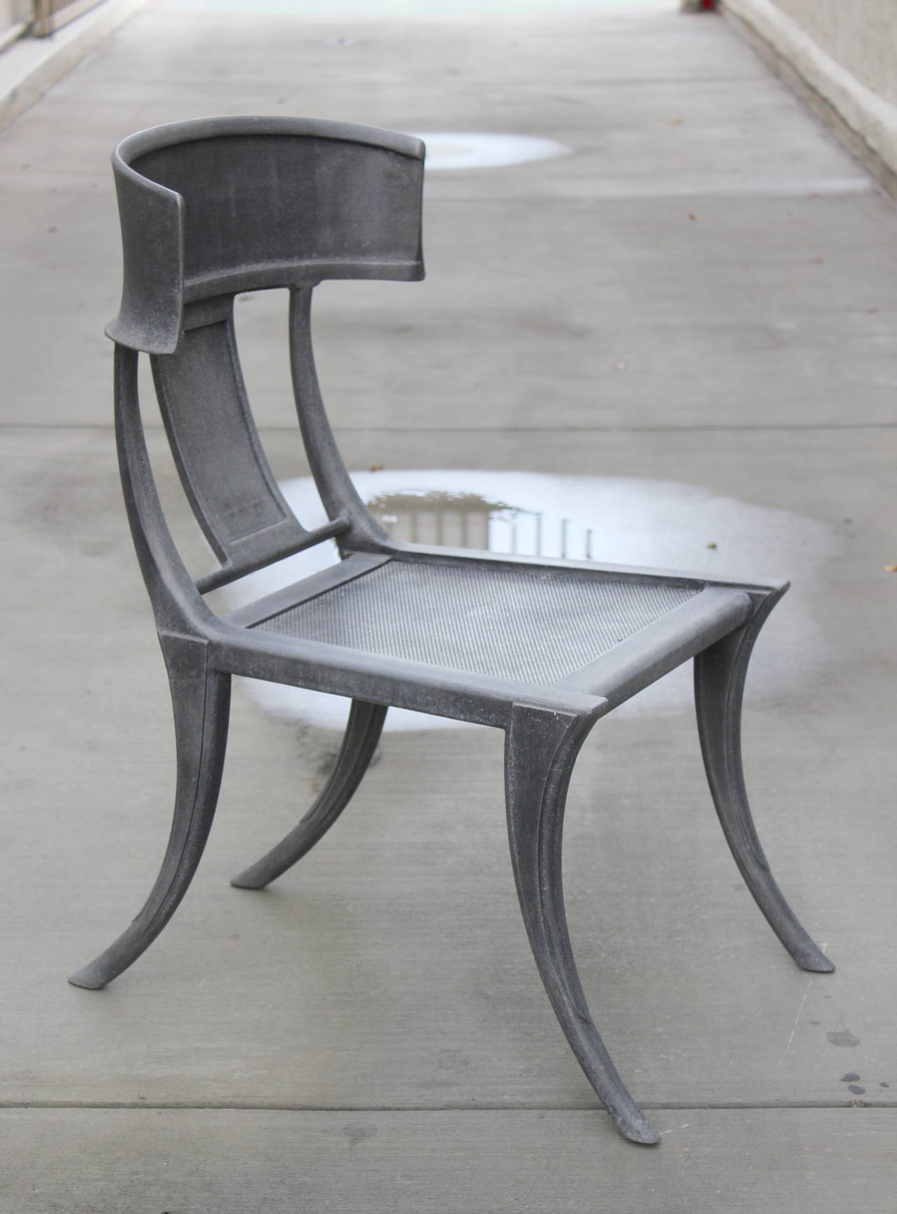 Pair of Michael Taylor Cast Aluminum Klismos Chairs.  Metal Mesh seats.