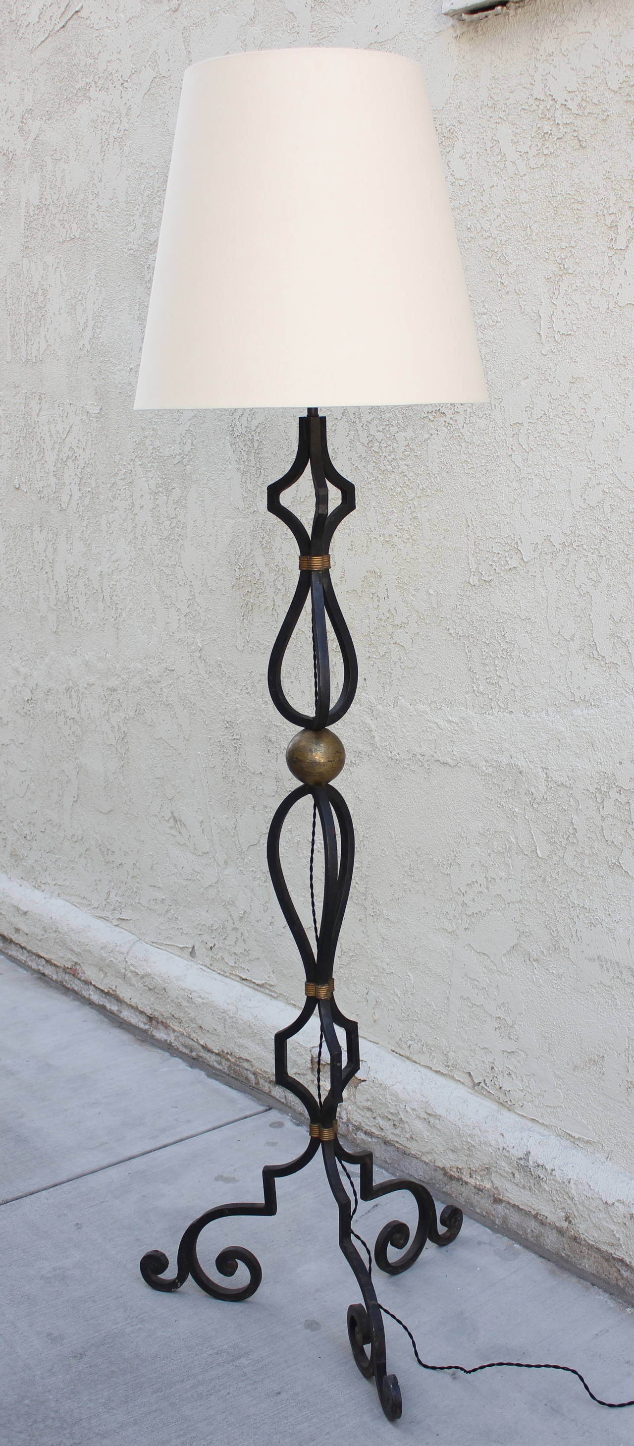 Arturo Pani bronze and wrought iron floor lamp. Executed by Studio Chacon. Mexico City, 1948. Hand-wrought. Rewired. Shade additional $400.00.