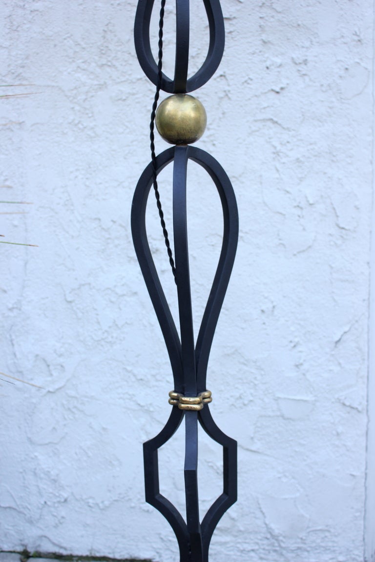 Arturo Pani Iron and Brass  Floor Lamp executed Talleres Chacon.  Mexico City.  1940s 
Newly rewired with double cluster and silk twist cord.  
Lamp shade is $425 additional.