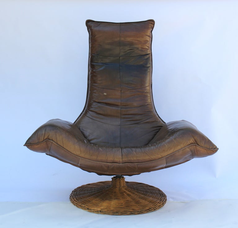 Gerard van den Berg Rattan and Leather Swivel Lounge Chair. Rattan. Original Leather - great patina!  Dutch  1970s