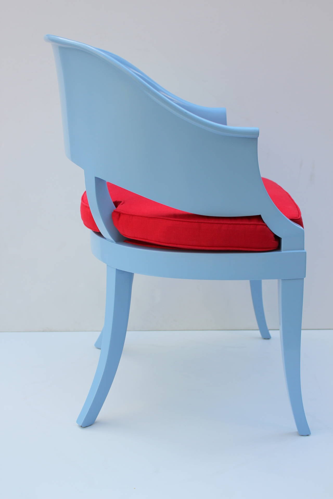 Lacquered side chair in the manner of Tommi Parzinger.
Scroll back.
        