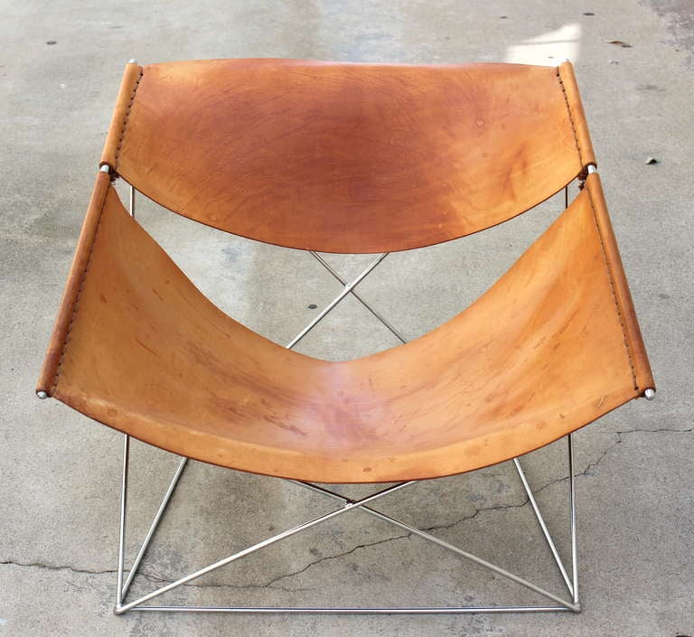 Pair of Pierre Paulin Butterfly Chairs for Artifort.   Saddle Stitched Leather.  Great Patina to leather.   Chrome  clean 