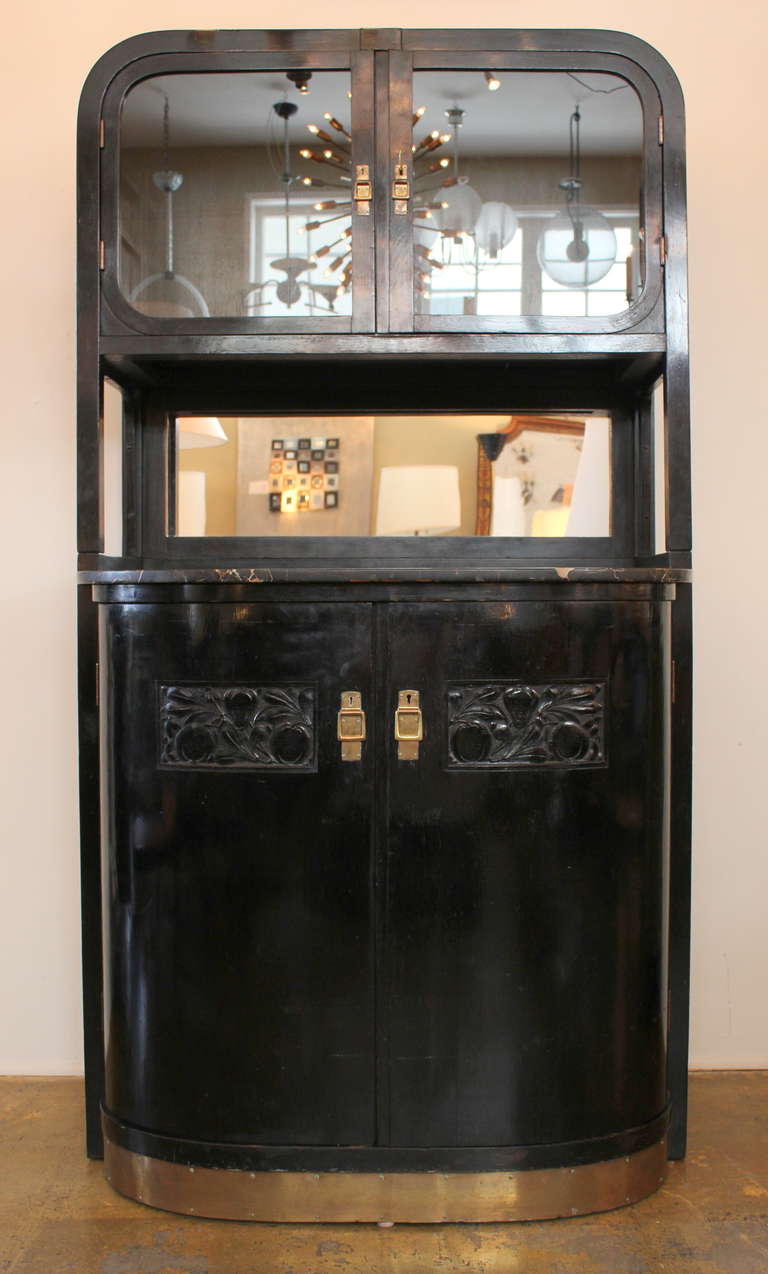 Secessionist Thonet Cabinet.  C: 1905 
Original Stained Beech Finish.   Signed with Original Label.   
Brass Surround at the Foot of the Cabinet.  Original Brass 
