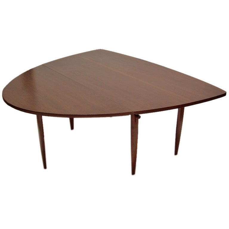 George Nakashima dining table fro Widdicomb. This is the most iconic Nakashima table that was done for Widdicomb. Shield shape. When table is closed, it measures 38