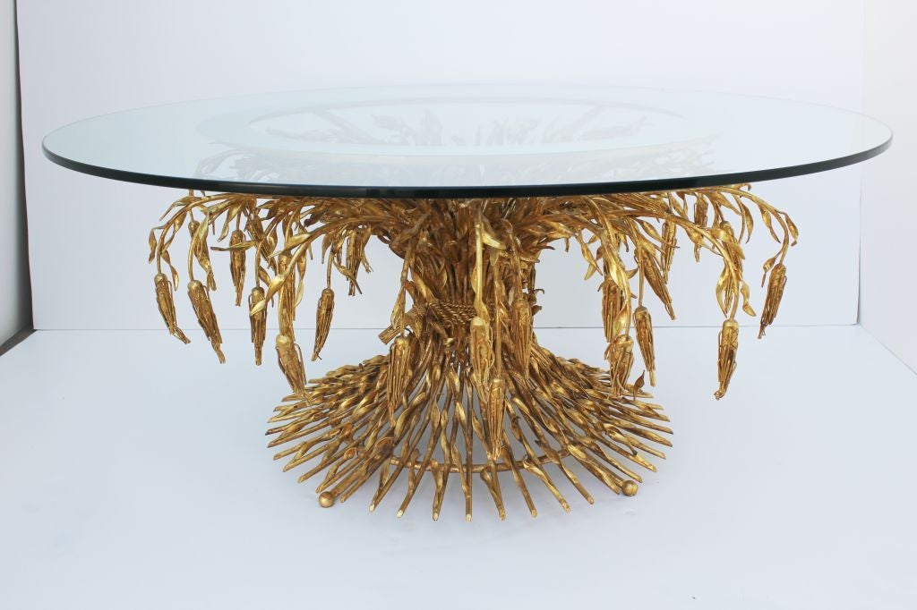 Arturo Pani 22KT Sheaf of wheat cockttail table.<br />
Arturo Pani (1915-1981?) was born in Mexico City to a well known diplomatic family. At the age of 4 in 1919 he traveled with his family to live in Europe as his father was appointed Mexico’s