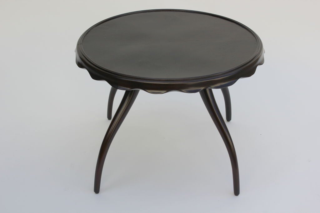Italian Walnut Cocktail Table with Scalloped Edge and Splayed Legs.  Ebony Brown Finish.