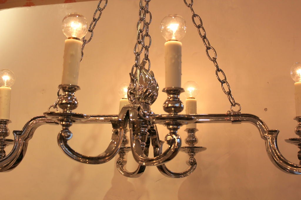 Great Rectangular Chandelier recently plated in Nickel and newly rewired.  Waxed Candle Covers.