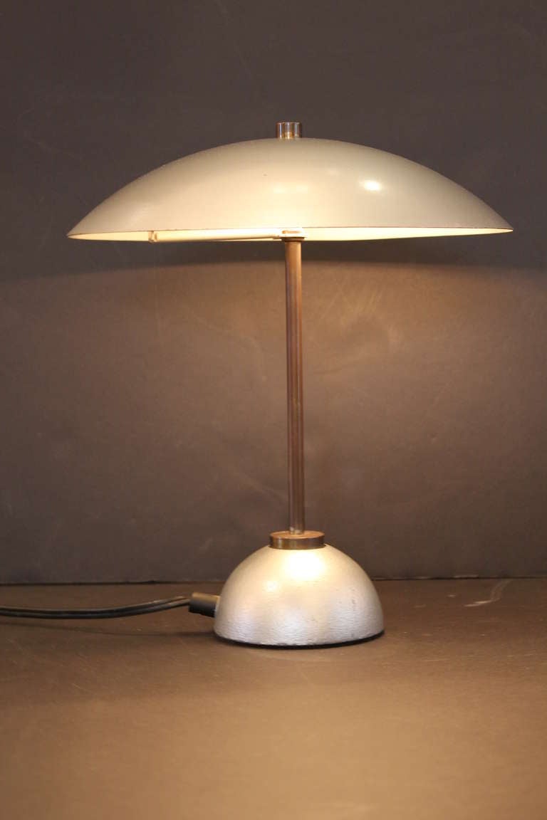 Post Modern Grey Metal and brass lamp.  Newly rewired with silk cord .  Cord switch.   1980s