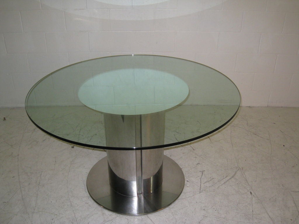 Chromed steel pedestal table with 50