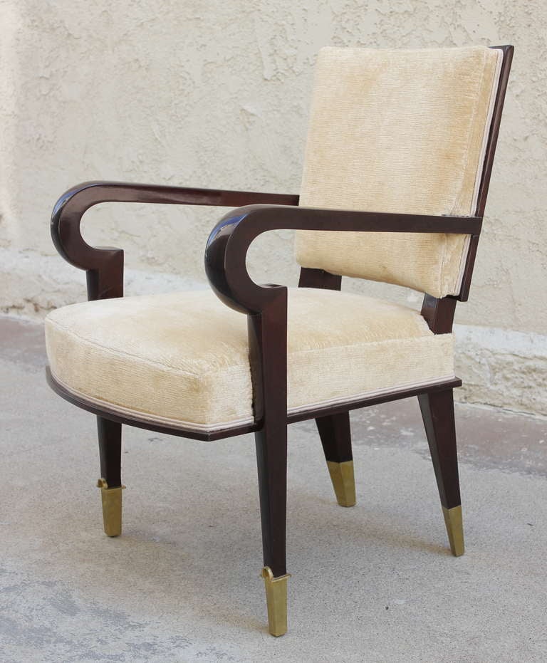 Mexico.
Period
: 1940s.
Description
: Robert and Mito Block custom mahogany armchair with brass sabots. New Linen Velvet Upholstery. Restored The Block Brothers immigrated to Mexico City in the late 1930s from their design business in Paris.