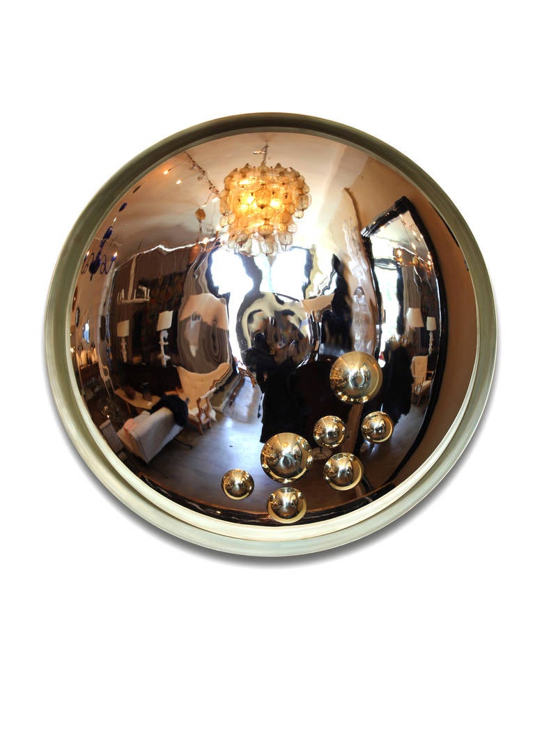 Aspis mirror
Inspired by Greek Antiquities
Designed by Onik Agaronyan
Natural brass frame with chrome convex mirror and polished brass accents