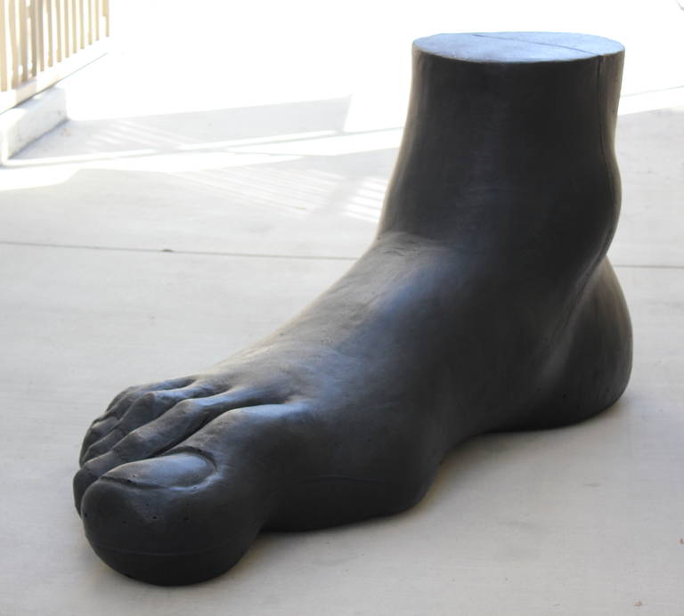 Designed by Gaetano Pesce in 1969 for B & B Italia the UP-7  Piede is made of flexible cold -shaped polyurethane foam .   it is not only a sculpture but a lounge.