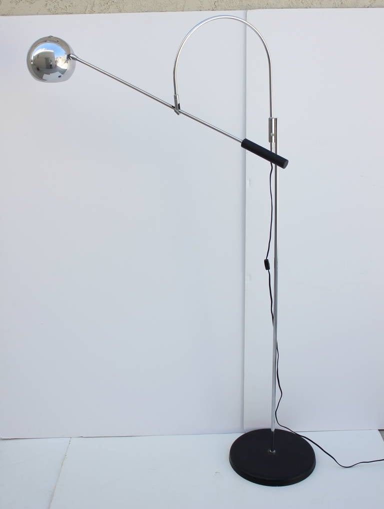 Sonneman Orbitor Floor lamp in Chrome with black metal base and handle. Circa 1960s