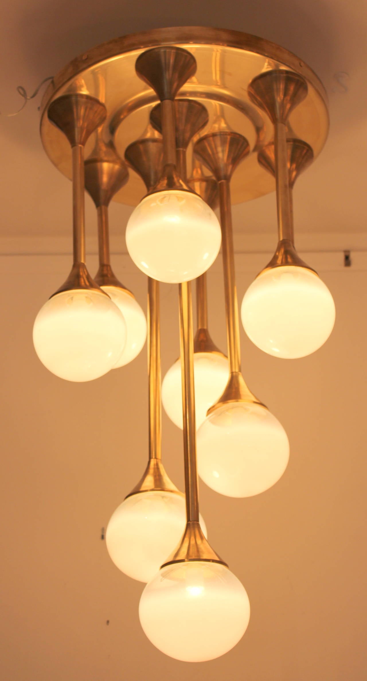 Targetti Sankey Chandelier, Italy  1960s with hand blown glass shades .  Brass
Rewired for US .