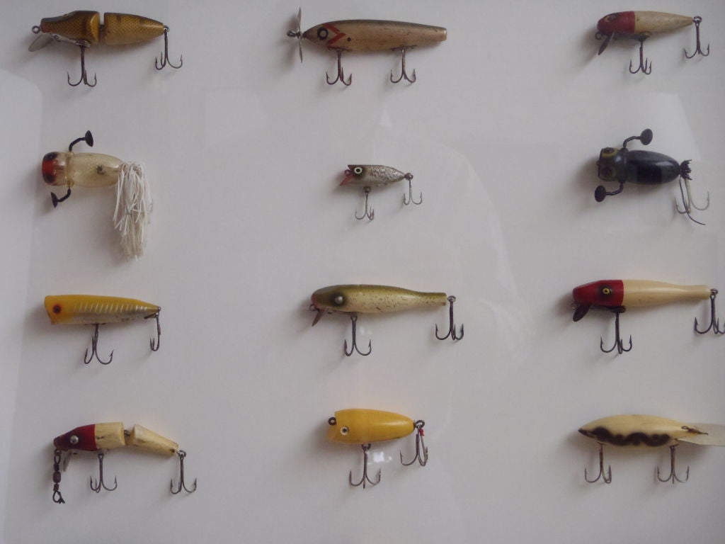 Vintage painted wood and celluloid fishing lures in new acid-free shadow box, black-painted wood frame and under Uv-protective glass. Dimensions are for frame, others available.