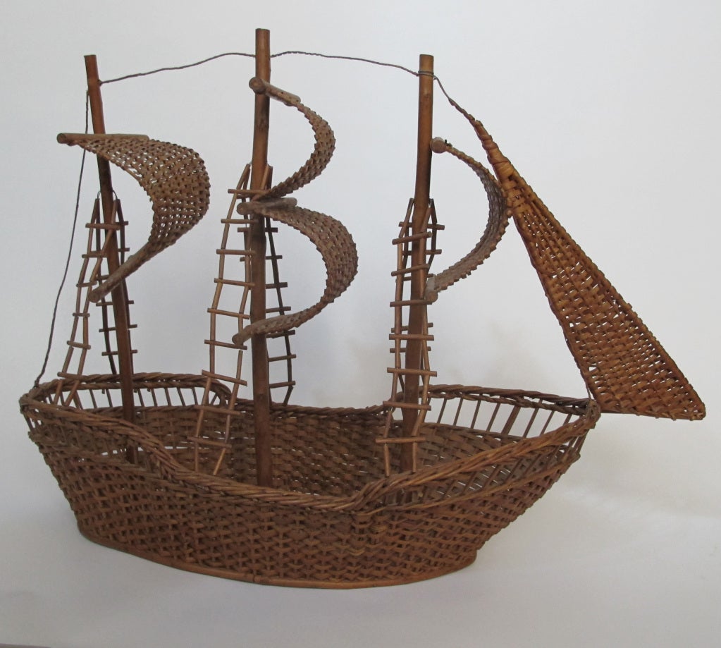 Vintage primitive wicker model of a sailing vessel