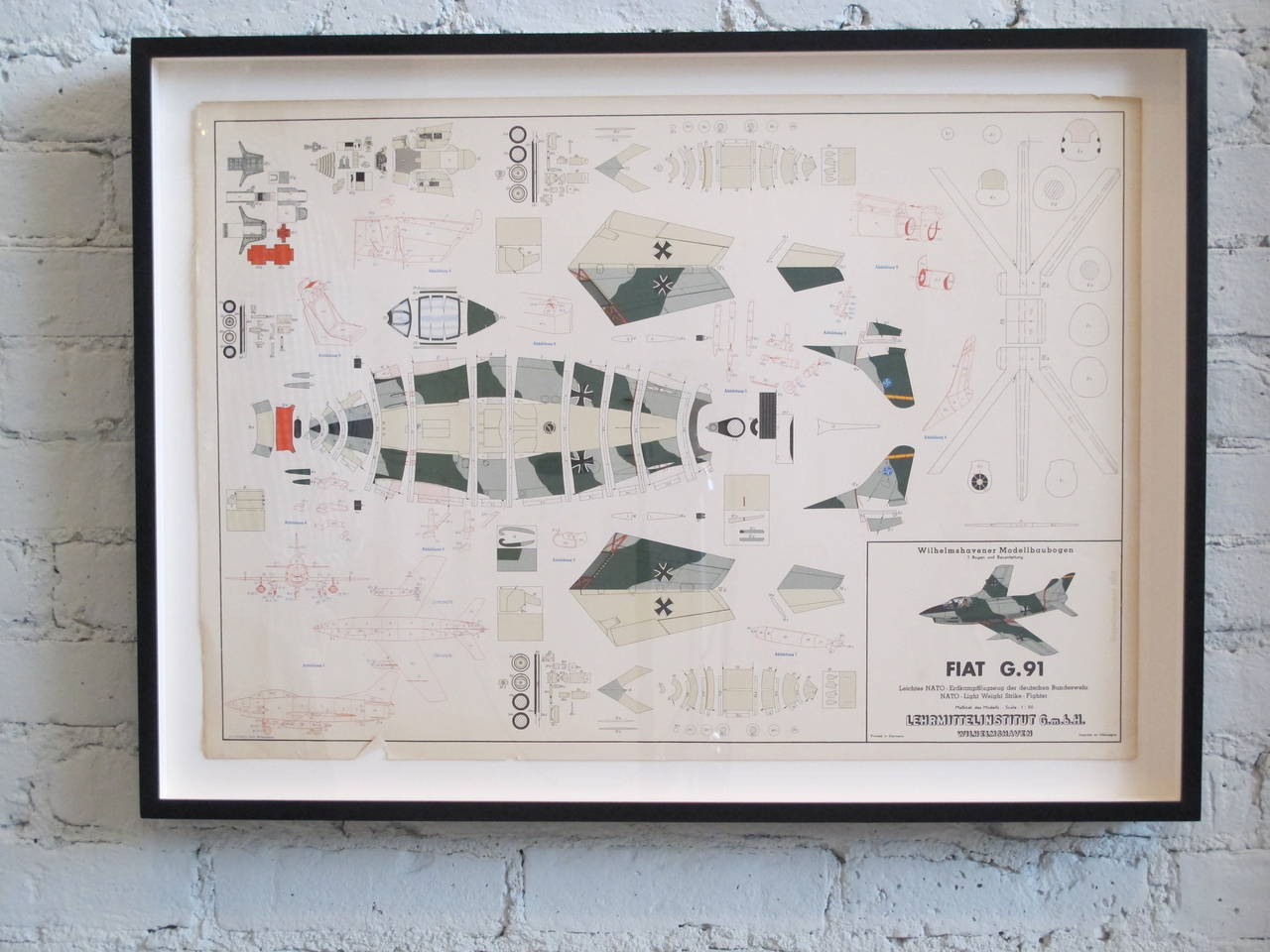 Vintage model of a Fiat G-91, newly framed in a black hand-painted frame, on acid free board under UV protective acrylic. Dimensions below are for the frame, print measures 23.5