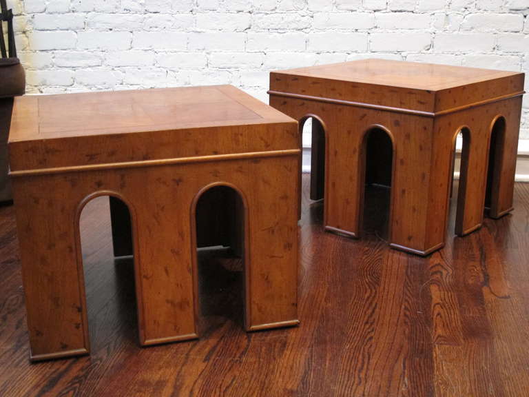 Pair of end tables that may also be used together as a coffee table, with parquet tops in a golden finish with faux burl painting.
