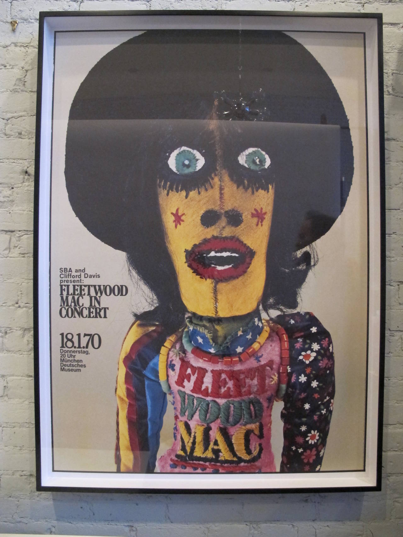 Period poster for Fleetwood Mac designed by Gunther Keiser. In new black painted wood frame, floating on acid-free board beneath UV protective acrylic.
Dimensions given below are for the frame, the poster measures 33