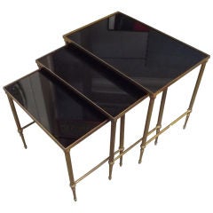 A Stack of Nesting Tables w/ Black Glass Tops