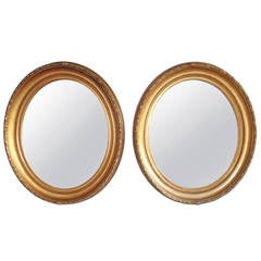 Antique Pair of Louis XVI Style Oval Mirrors