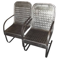 Pair of Polished Steel Armchairs