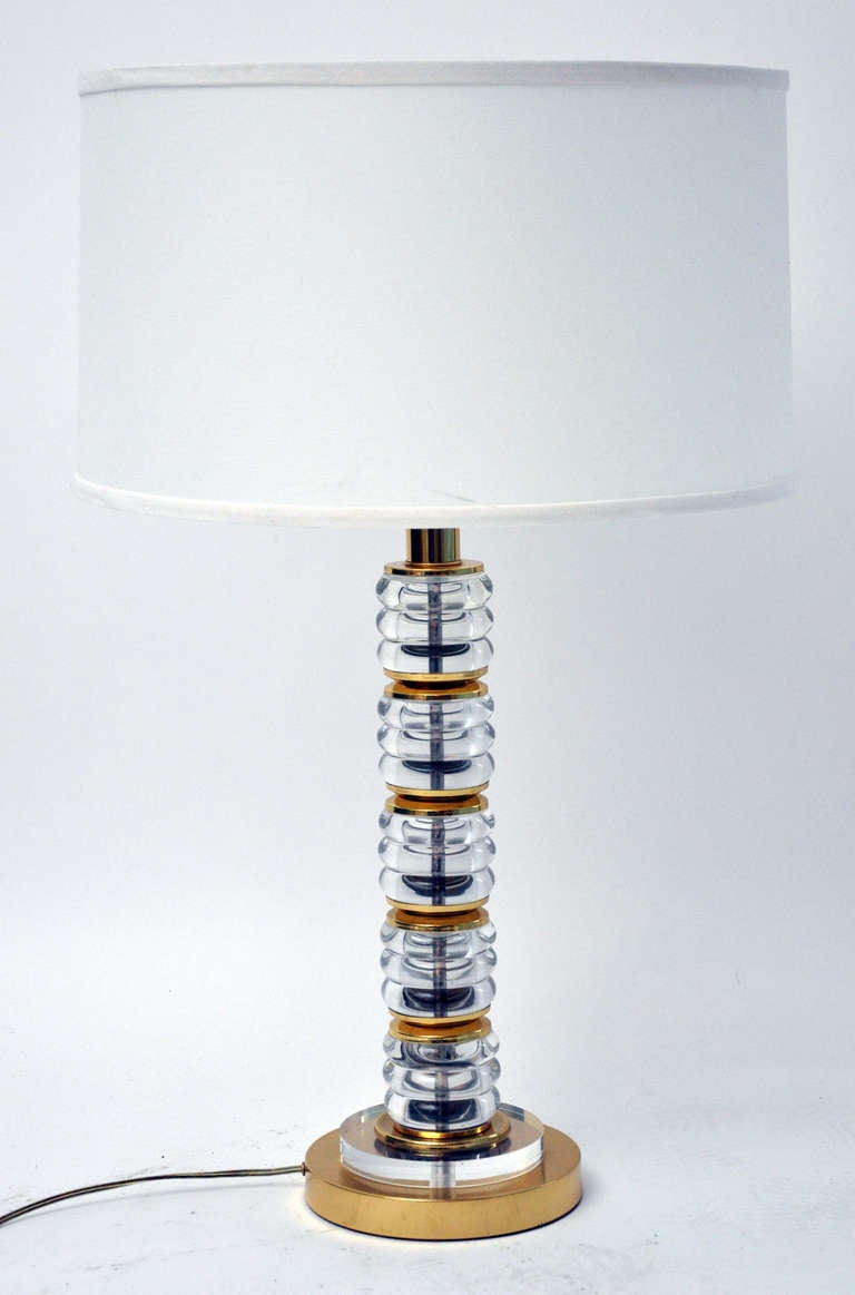1970s lucite and brass table lamp by Paul Hanson.  Shade not included.  The diameter of 8