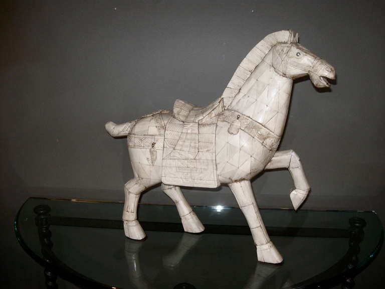 Beautifully detailed sculpture of horse fabricated from bone.