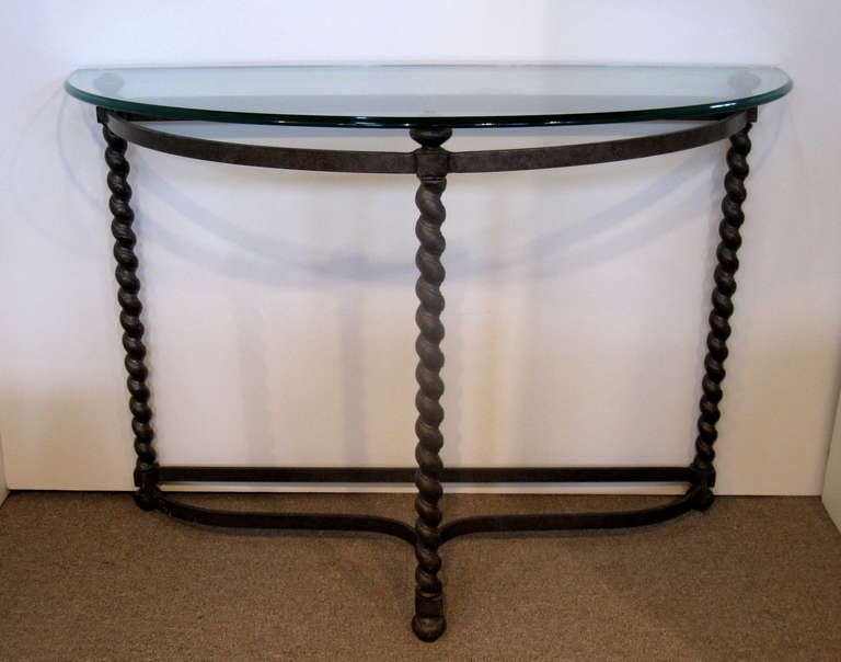 Demi- lune console table, deep gunmetal in color, featuring barley twist legs with a 
