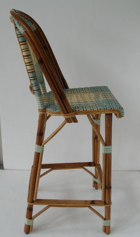 French THREE FRENCH BAMBOO AND RATTAN BAR STOOLS