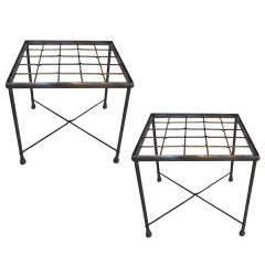 PAIR OF IRON AND BRASS END / SIDE TABLES