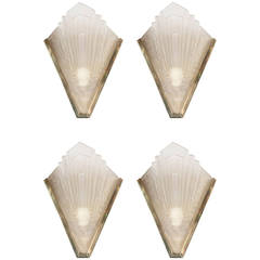 Set of Four Art Deco Relief Glass and Brass Sconces by Degué
