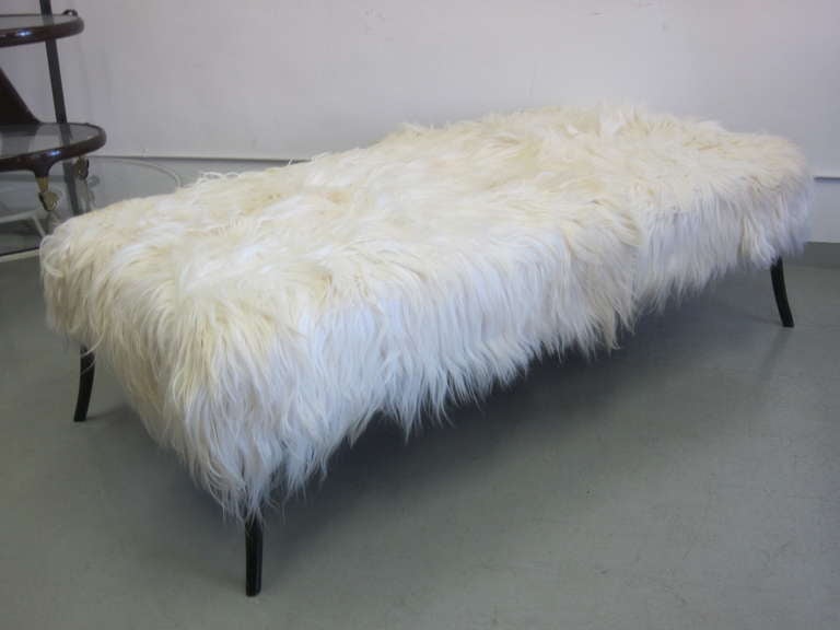 Large long hair goat skin bench with hand-carved canted legs in the Style of Ico Parisi

This piece can be custom-made to your specifications.