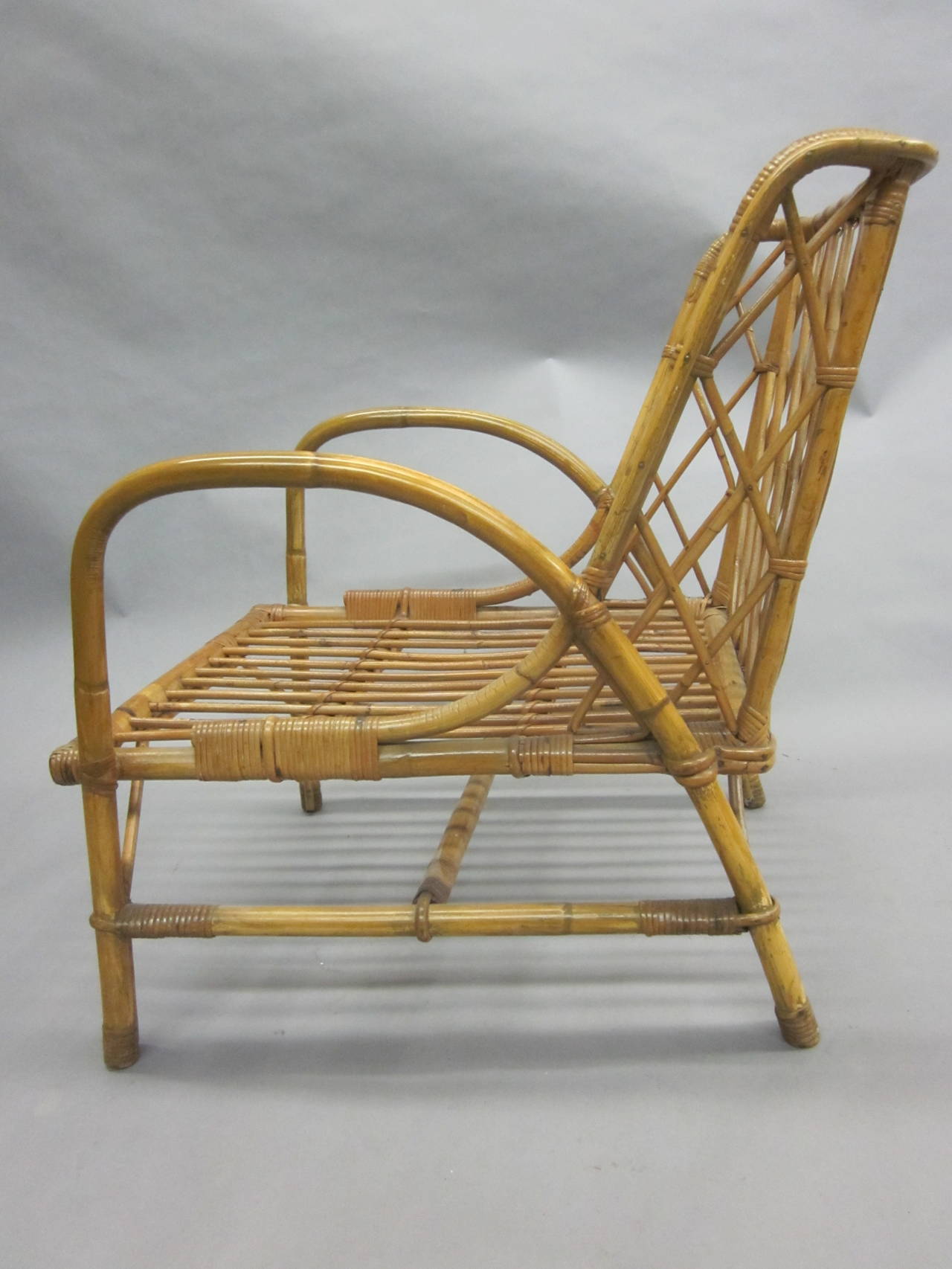 Mid-20th Century Pair of Rattan Armchairs by Jacques Quinet