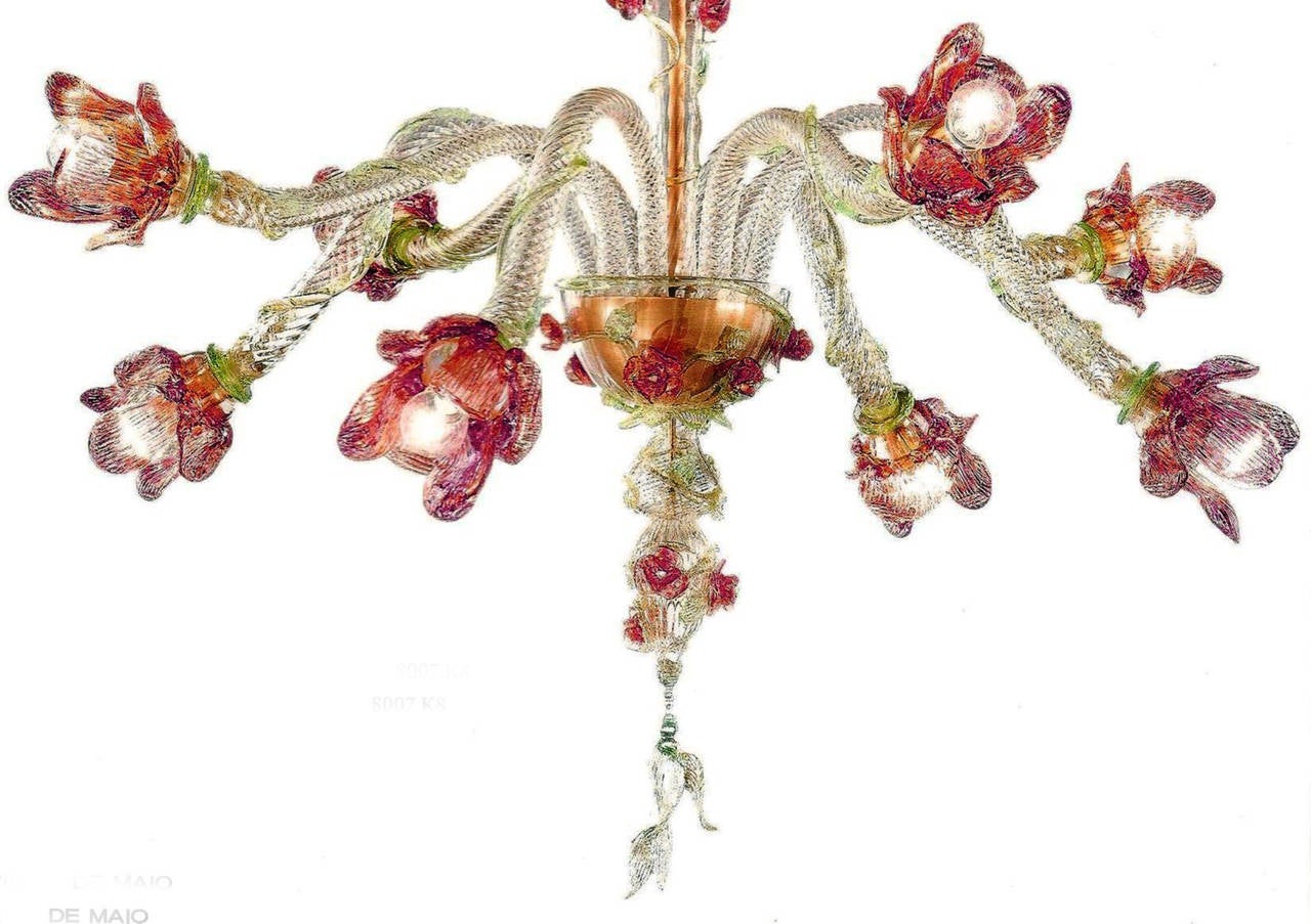 Romantic, feminine Italian midcentury style Murano glass chandelier or pendant with eight arms with subtle, modern spiraling floral forms. A delightful masterpiece of color, balance and harmony.

Eight lights at 40 watts each, incandescent bulbs.