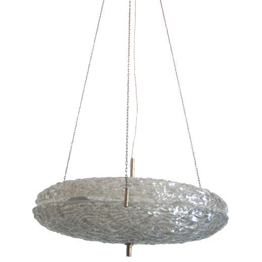 Elegant Swedish Mid-Century Modern double sided handblown glass fixture / suspension chandelier with an open revealed center seam. Lighting elements enclosed in the center. Suspended from a small link chain. Height as shown is 47