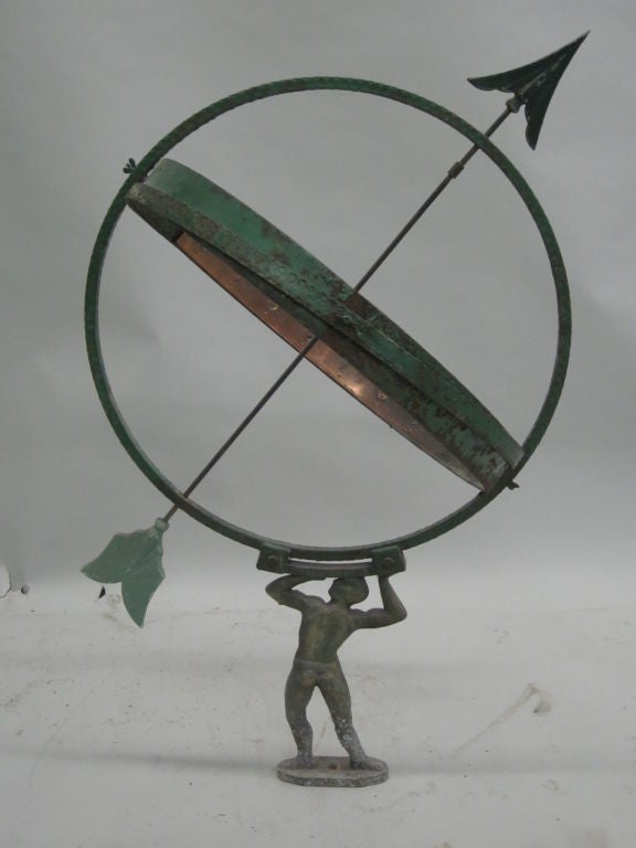 An Iconic Sundial / Weathervane Featuring the Image of Atlas Supporting the Earth.