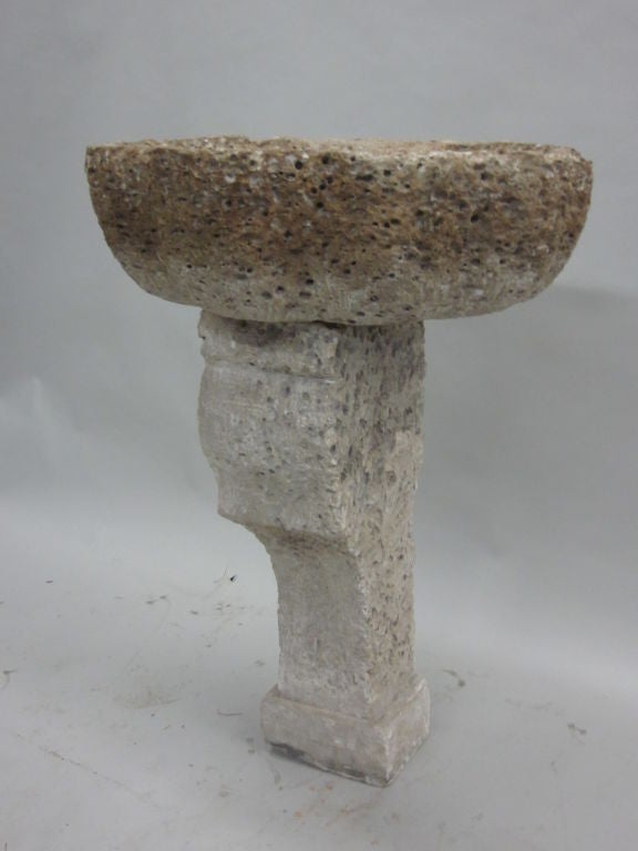 French, 18th century hand-carved neoclassical column with stone vasque / sink, both made from fossilized limestone from the remains of ancient sea life. These pieces can be used indoors or outdoors.

References: Bath sink with column, garden